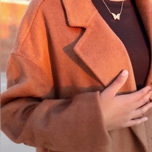 Handmade wool-blend, double-breasted longline coat